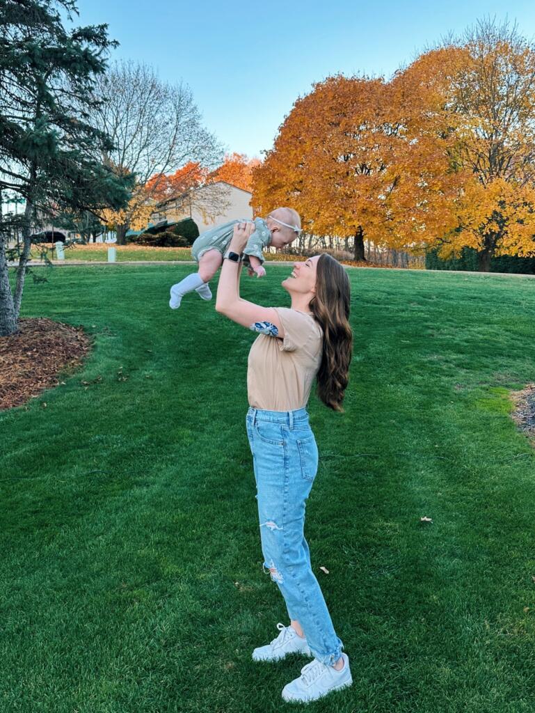 Woman Holding Her Baby With an AP System