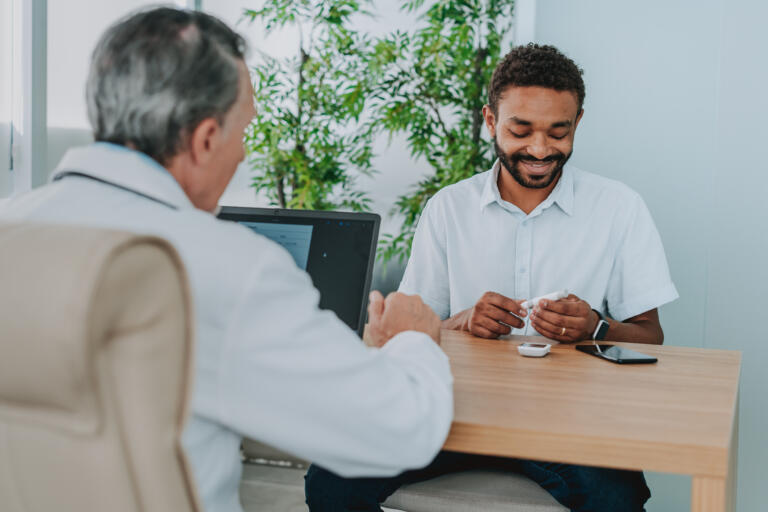 Doctor meets with patient with type 1 diabetes