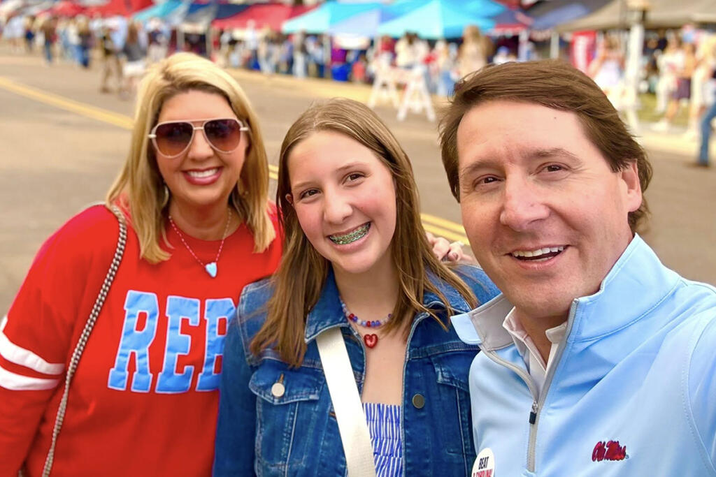 Forrest Johnson with his wife and daughter, who lives with type 1 diabetes