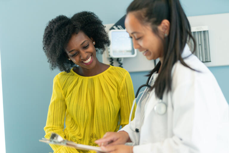 Young woman meets with her OB-GYN