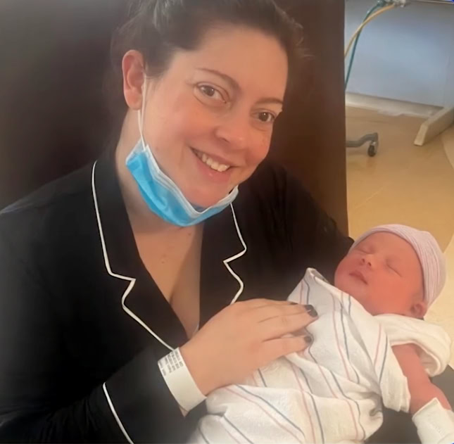 Liz, who lives with type 1 diabetes, after the healthy birth of her son, Julian