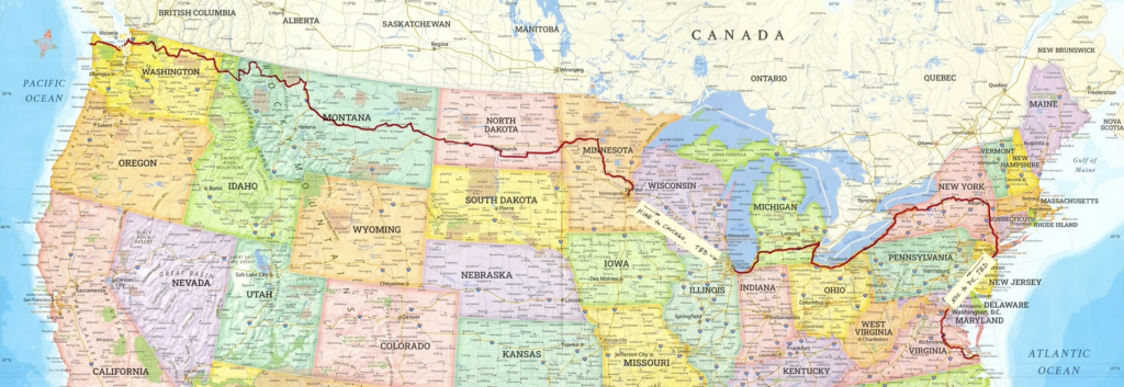 A map of the northern half of the United States with a cross-country bike route drawn on it.